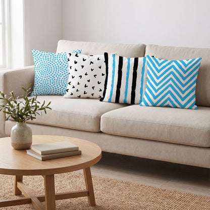 Sky Blue Mix — set of four printed cushions on a sofa — Karen Fabrics