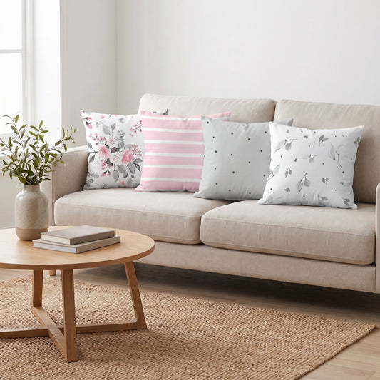 Rose & Stripe — set of four printed cushions on a sofa — Karen Fabrics