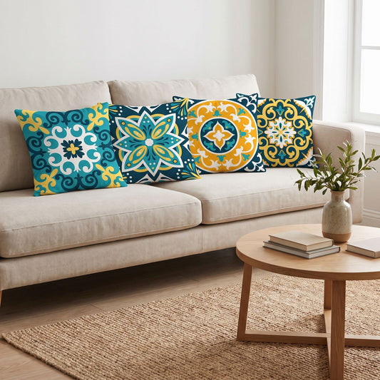 Talavera Tiles — set of four printed cushions on a sofa — Karen Fabrics