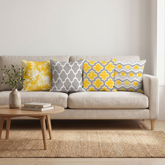 Mustard & Grey — set of four printed cushions on a sofa — Karen Fabrics