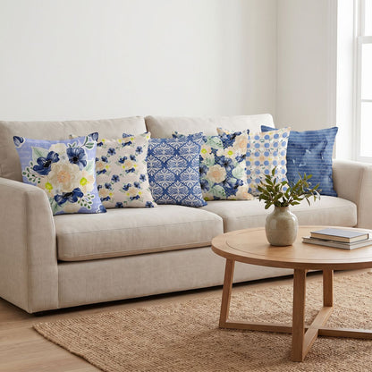 Blue Blossom — set of six printed cushions on a sofa — Karen Fabrics