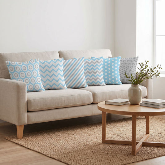 Baby Blue — set of six printed cushions on a sofa — Karen Fabrics