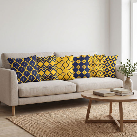 Deco Navy — set of six printed cushions on a sofa — Karen Fabrics