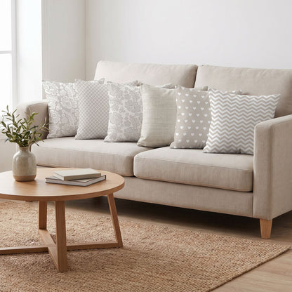 Soft Grey — set of six printed cushions on a sofa — Karen Fabrics