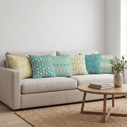 Teal Medallion — set of six printed cushions on a sofa — Karen Fabrics