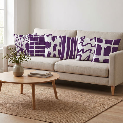 Plum Brush — set of six printed cushions on a sofa — Karen Fabrics