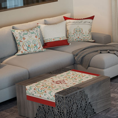 Coral Arabesque — the three cushions and the coffee-table runner