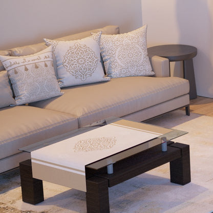 Ivory Arabesque — the three cushions and the coffee-table runner