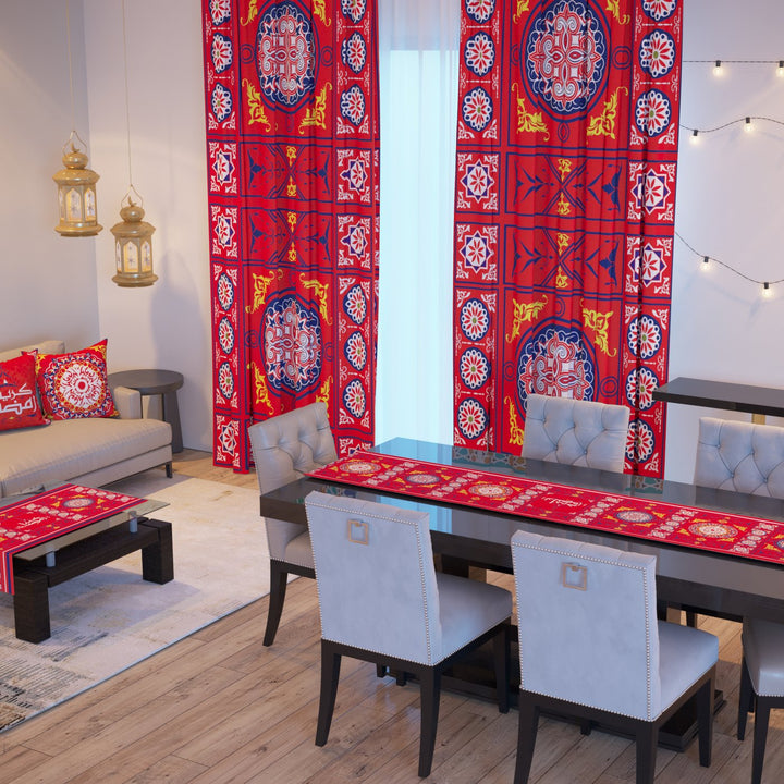 A Ramadan set in a living room: red khayamiya curtains, three cushions and the table runners